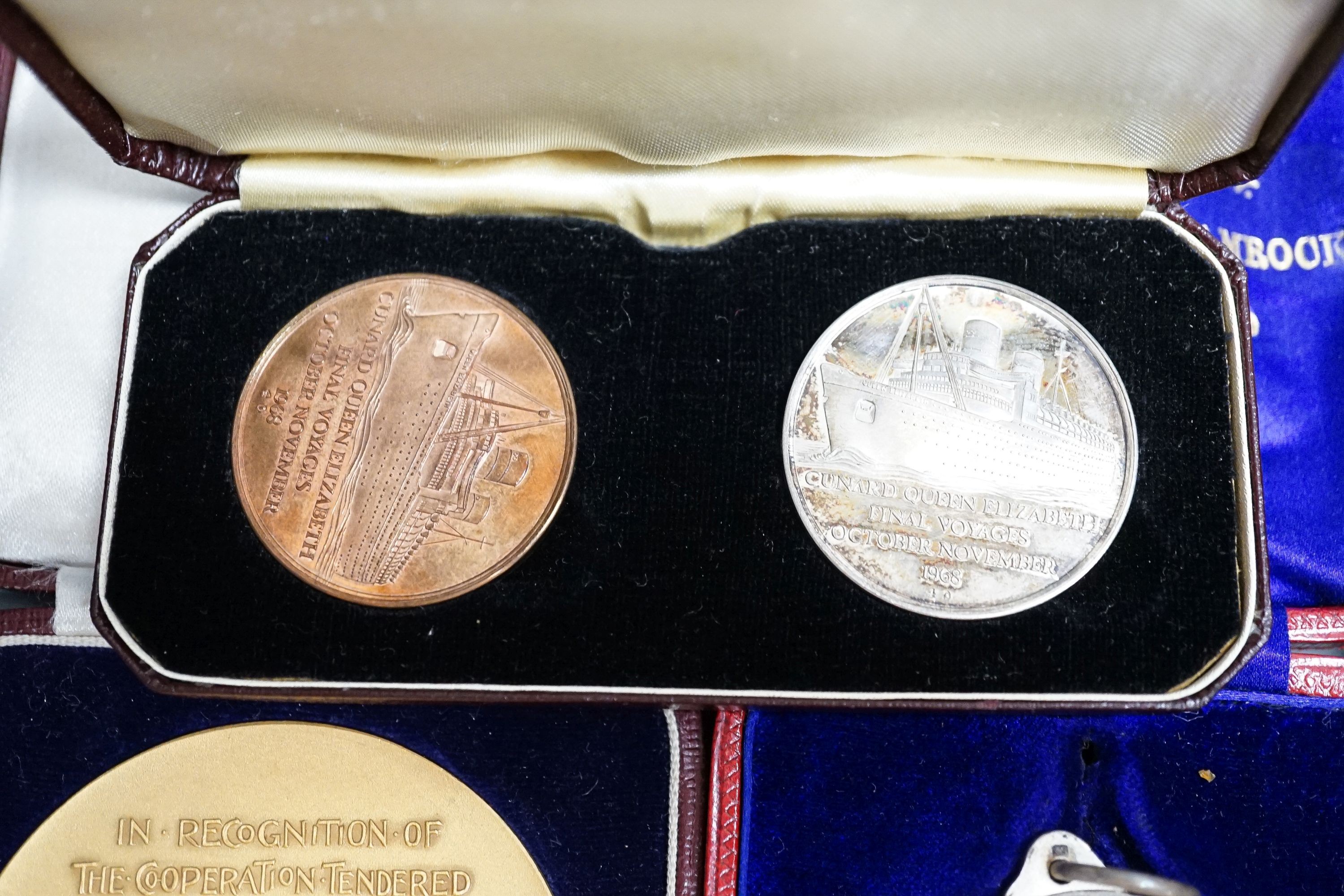 A group of UK coins and medallions, some silver issues